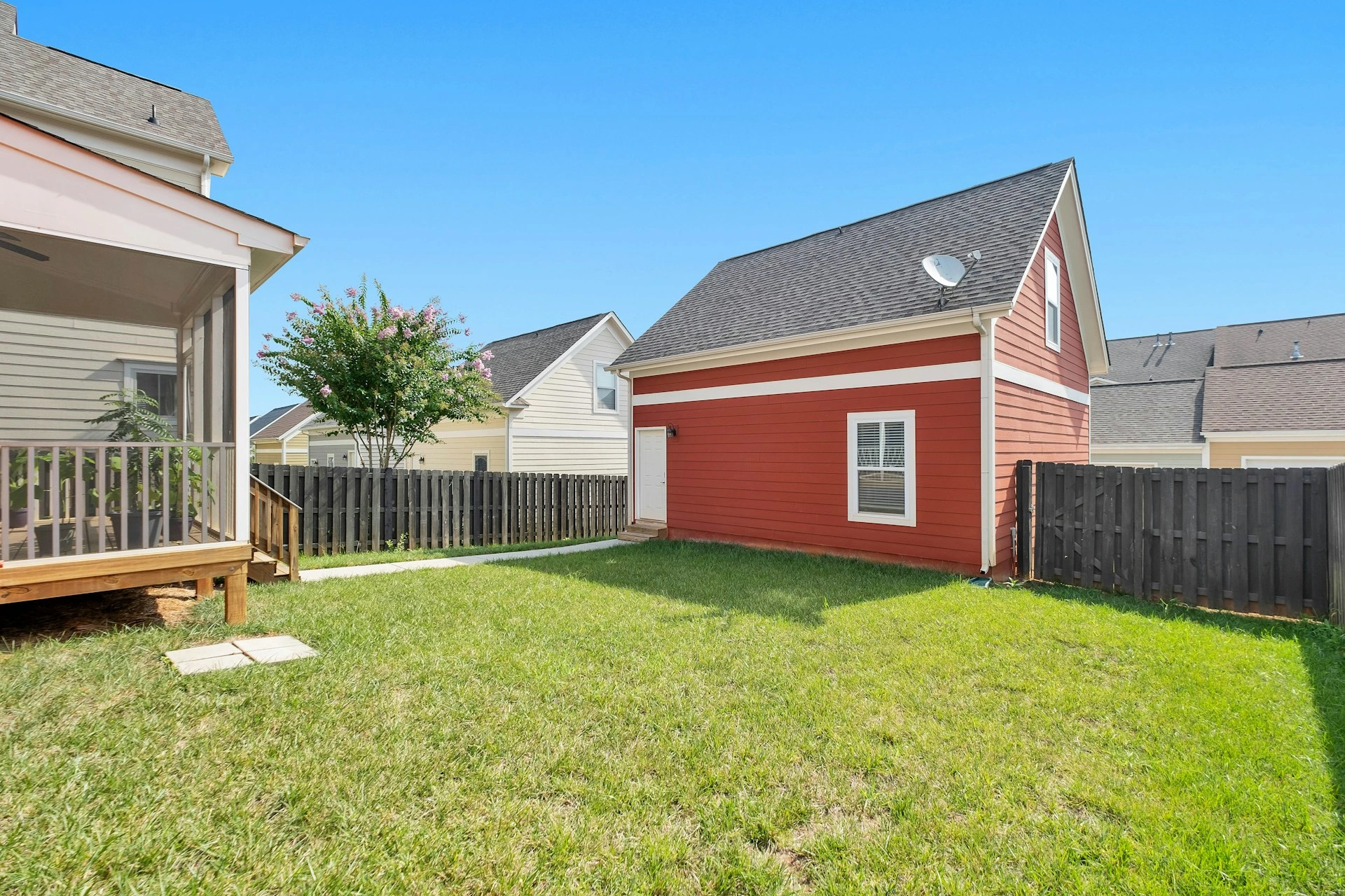 Calgary home backyard and detached garage illustrating property boundaries for real property report.