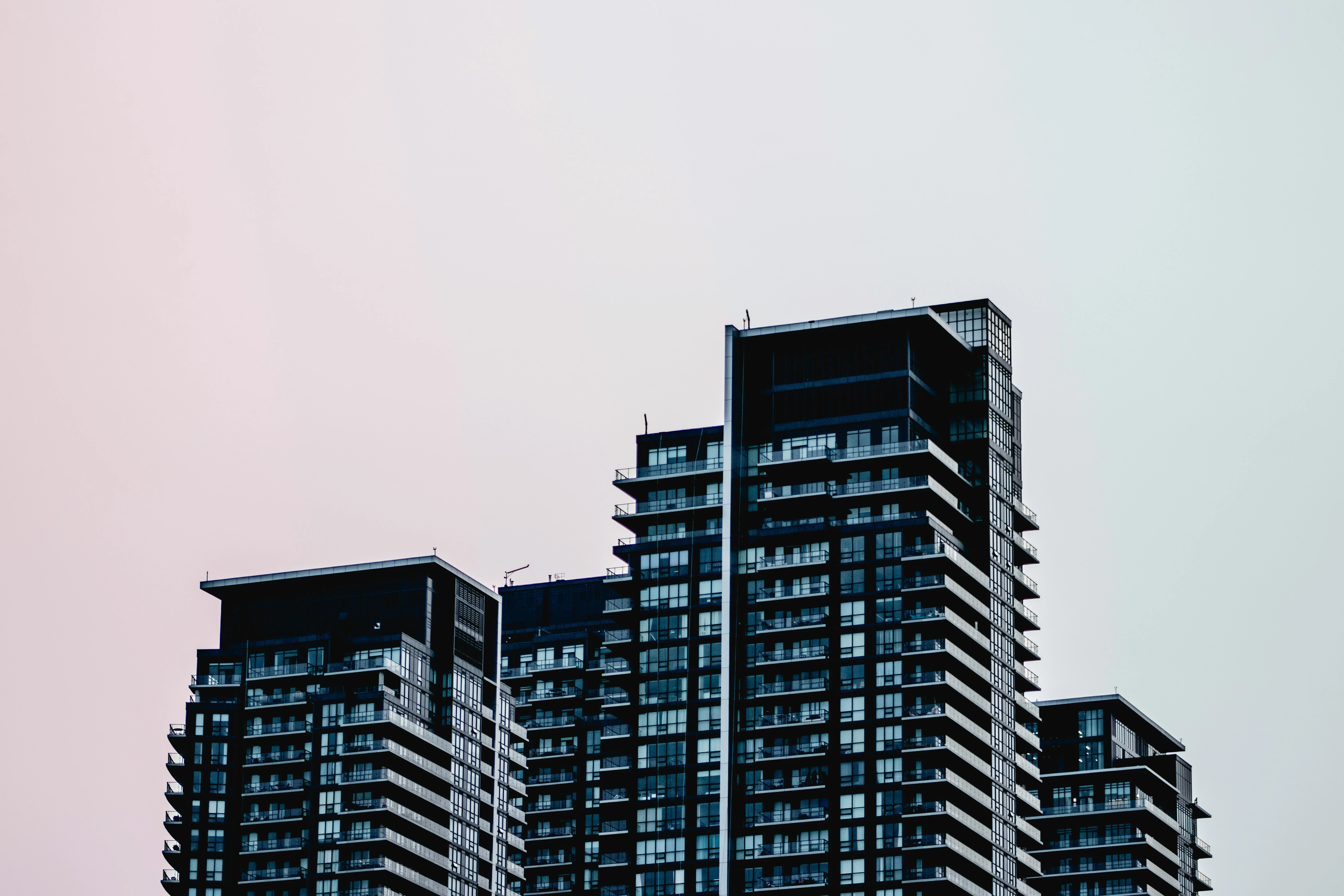 High-rise condo buildings in Calgary representing real estate investment opportunities.