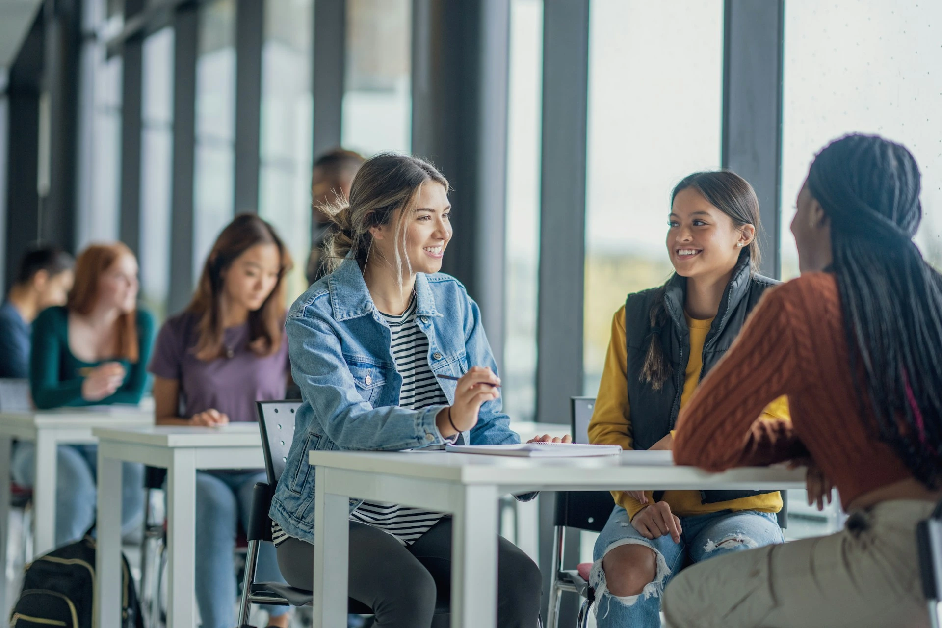 Group of students studying together in Calgary, highlighting education opportunities for newcomers.