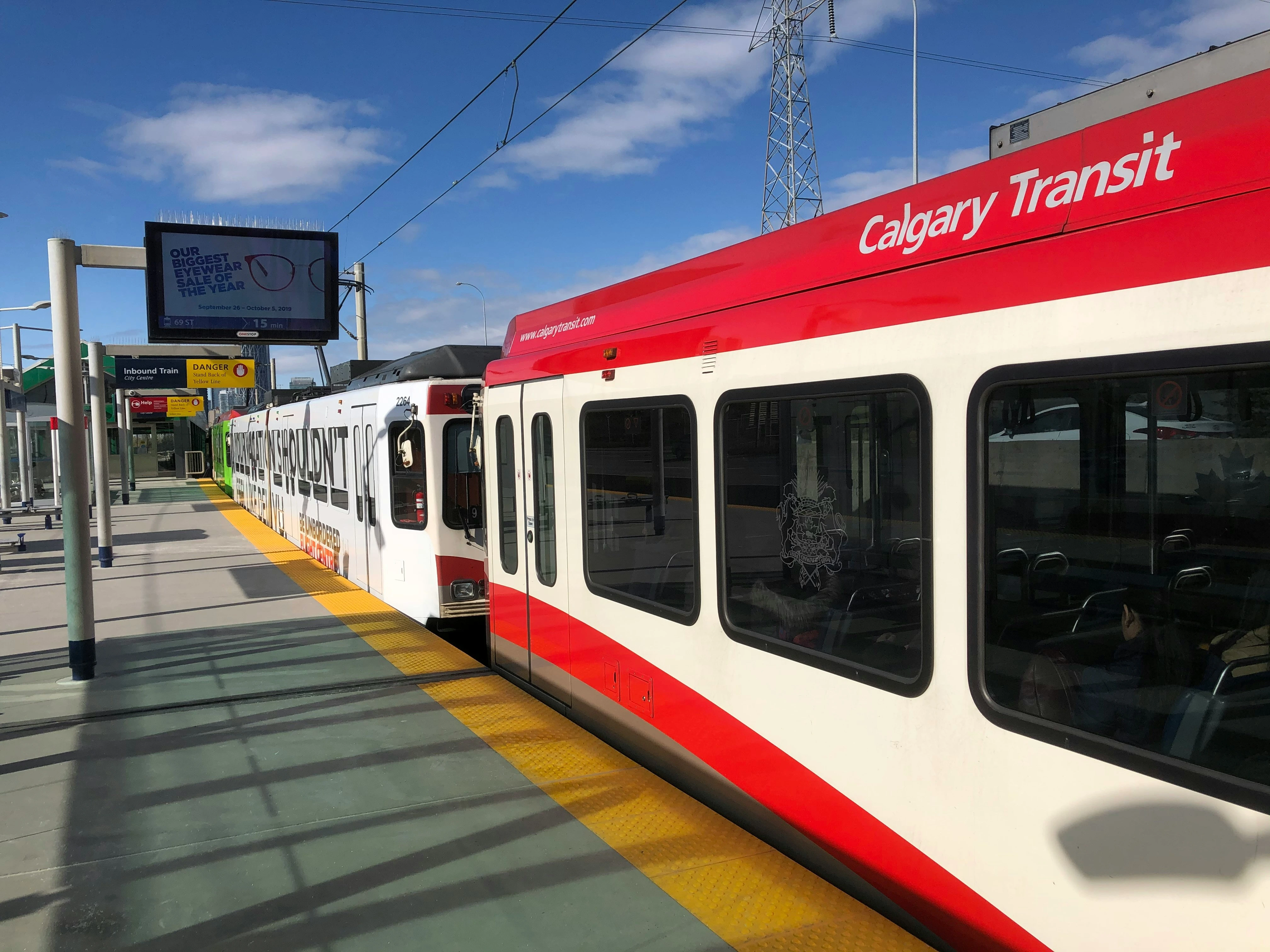 Calgary Transit C-Train at station, showing public transportation options for newcomers.