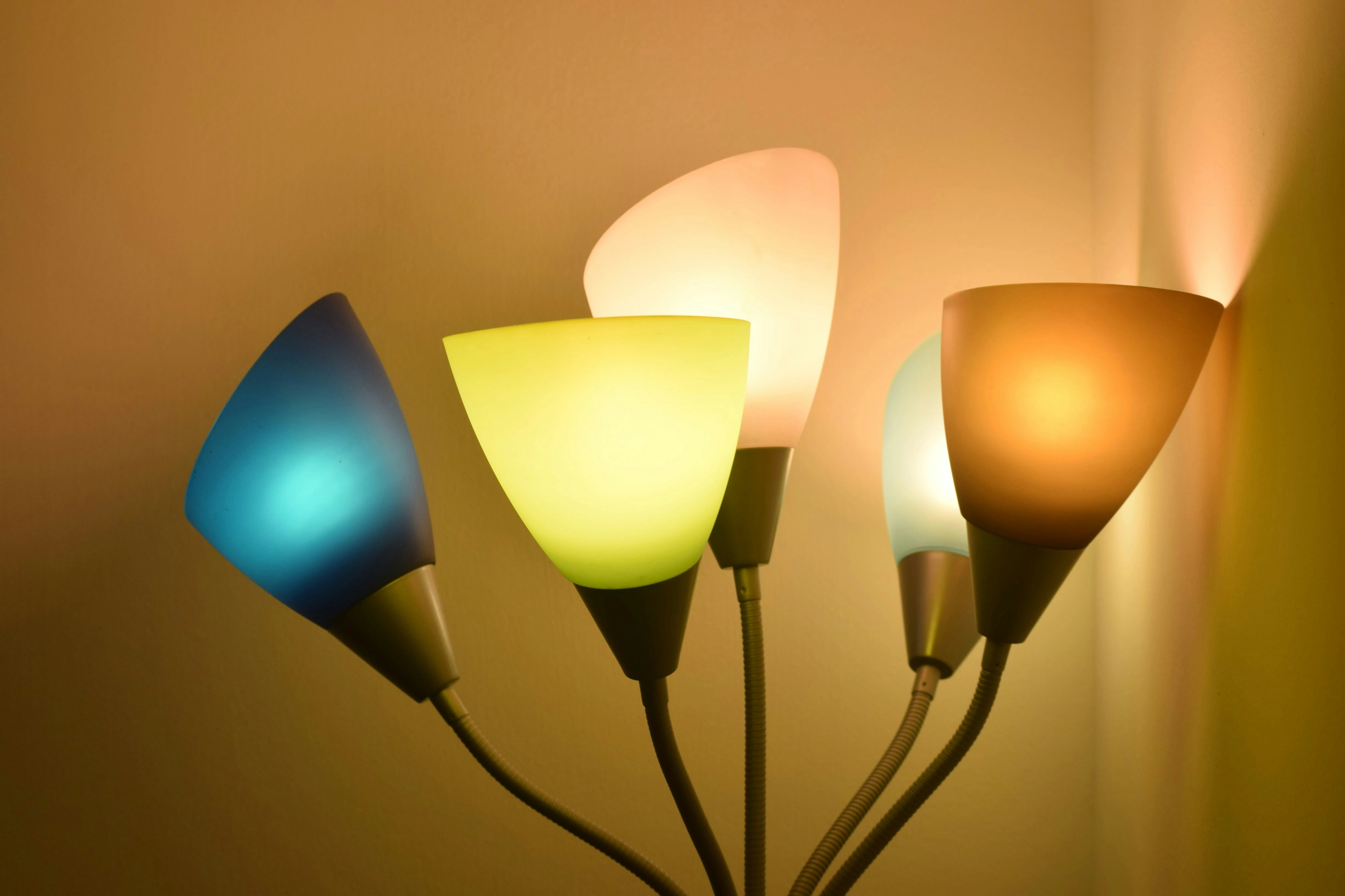 Colorful LED lamps glowing in a room showing energy-efficient lighting.