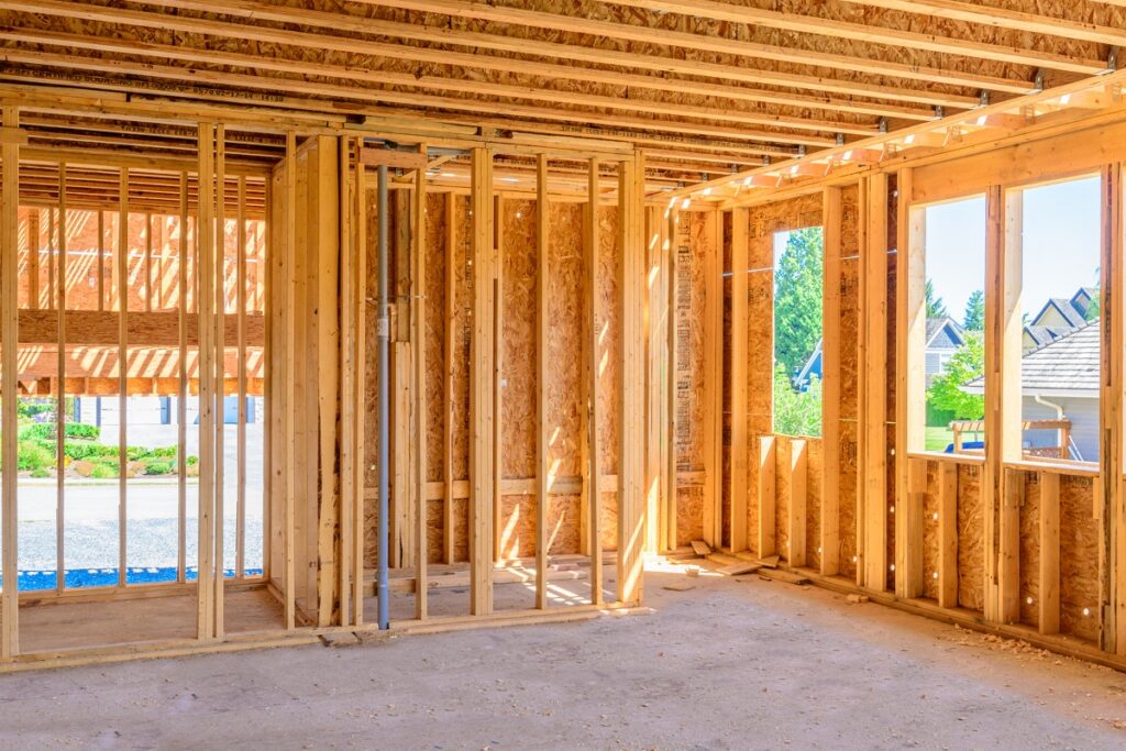 New home construction framing in Carrington, a new-build community in northwest Calgary