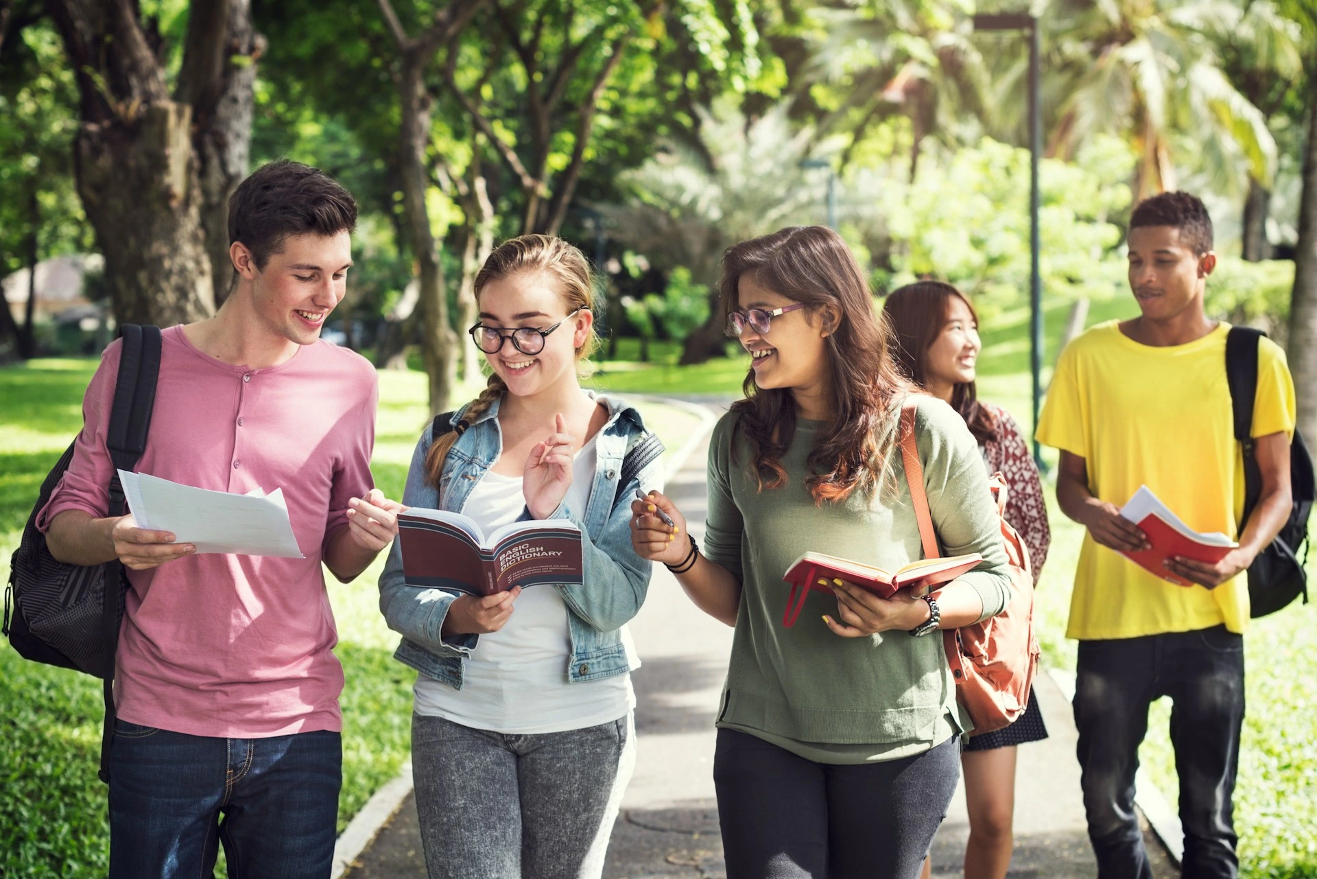 Group of university students walking outdoors near Brentwood Calgary, representing proximity to the University of Calgary.