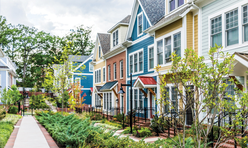 Row of suburban townhouses on a quiet street in Beddington Heights, Calgary