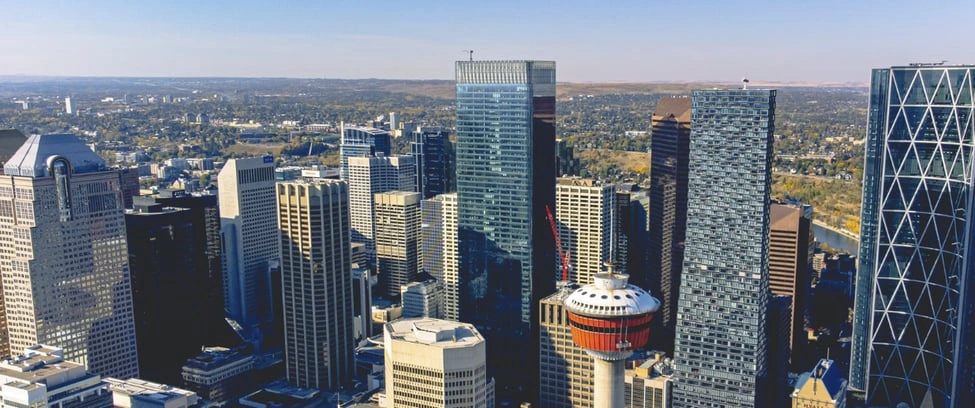 Calgary downtown skyline with Calgary Tower, symbolizing the city as a 2025 real estate hotspot.